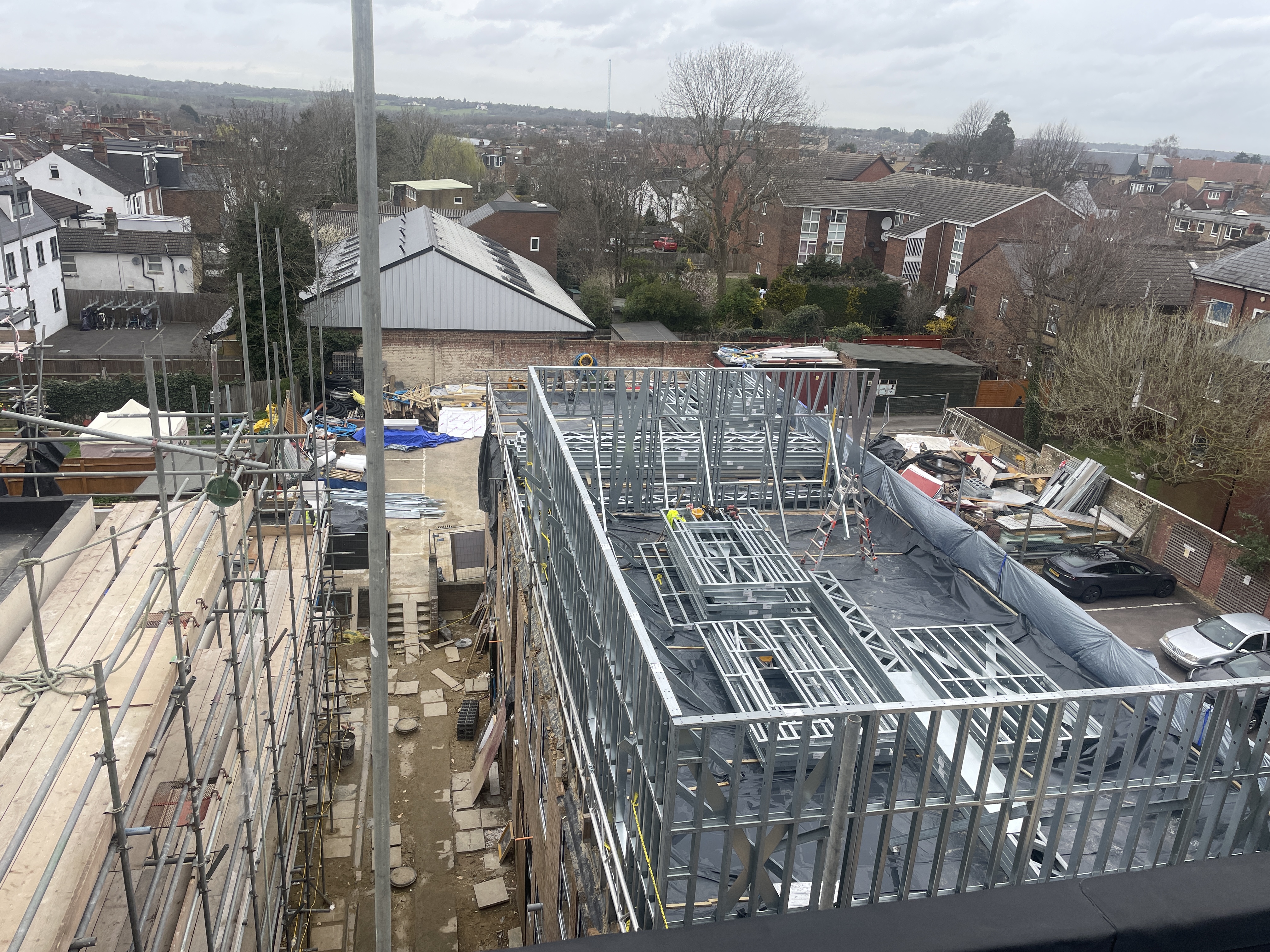 Trident construction specialist working within a dramatic loft structure